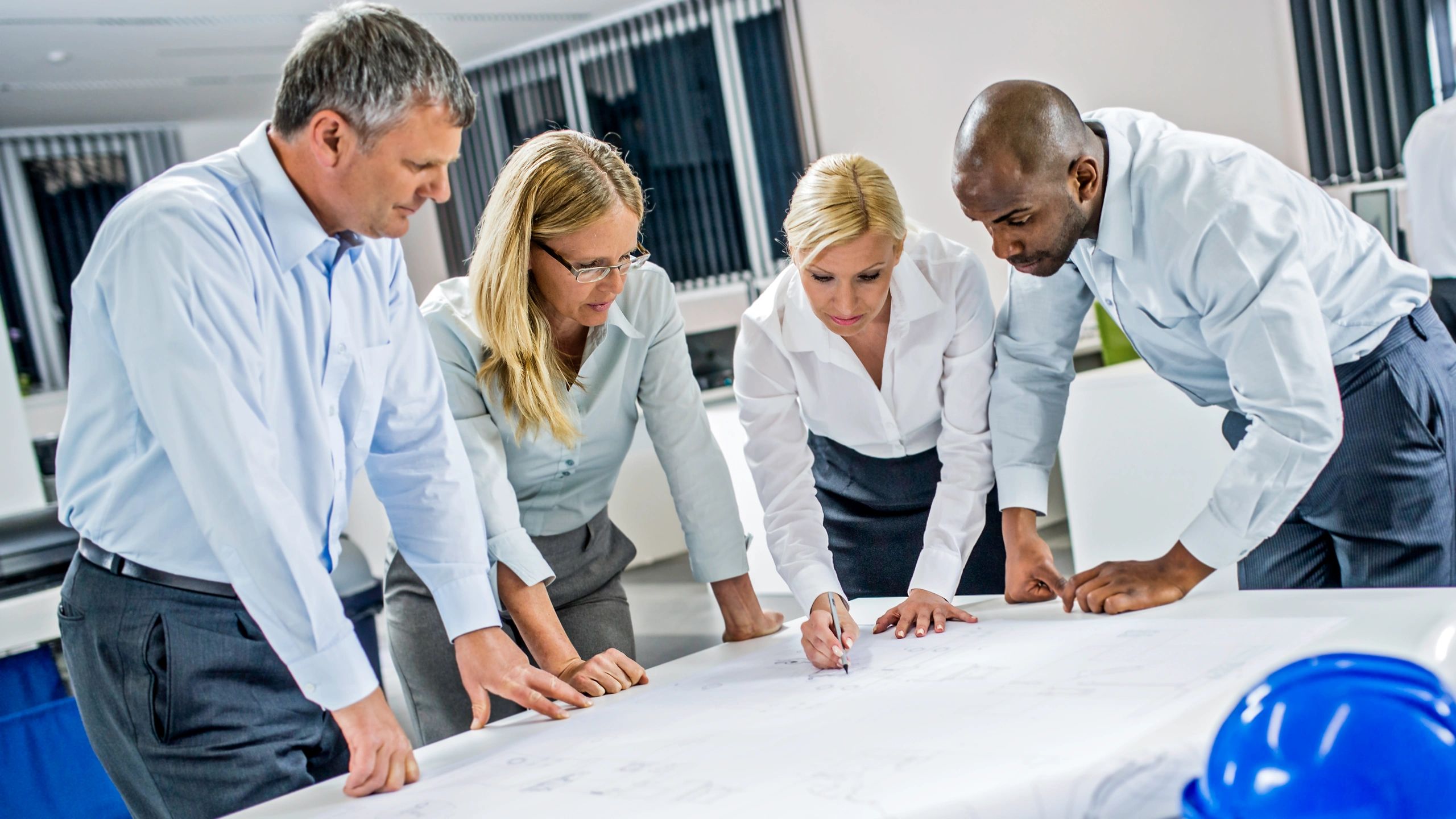 Engineers collaborating on a development project
